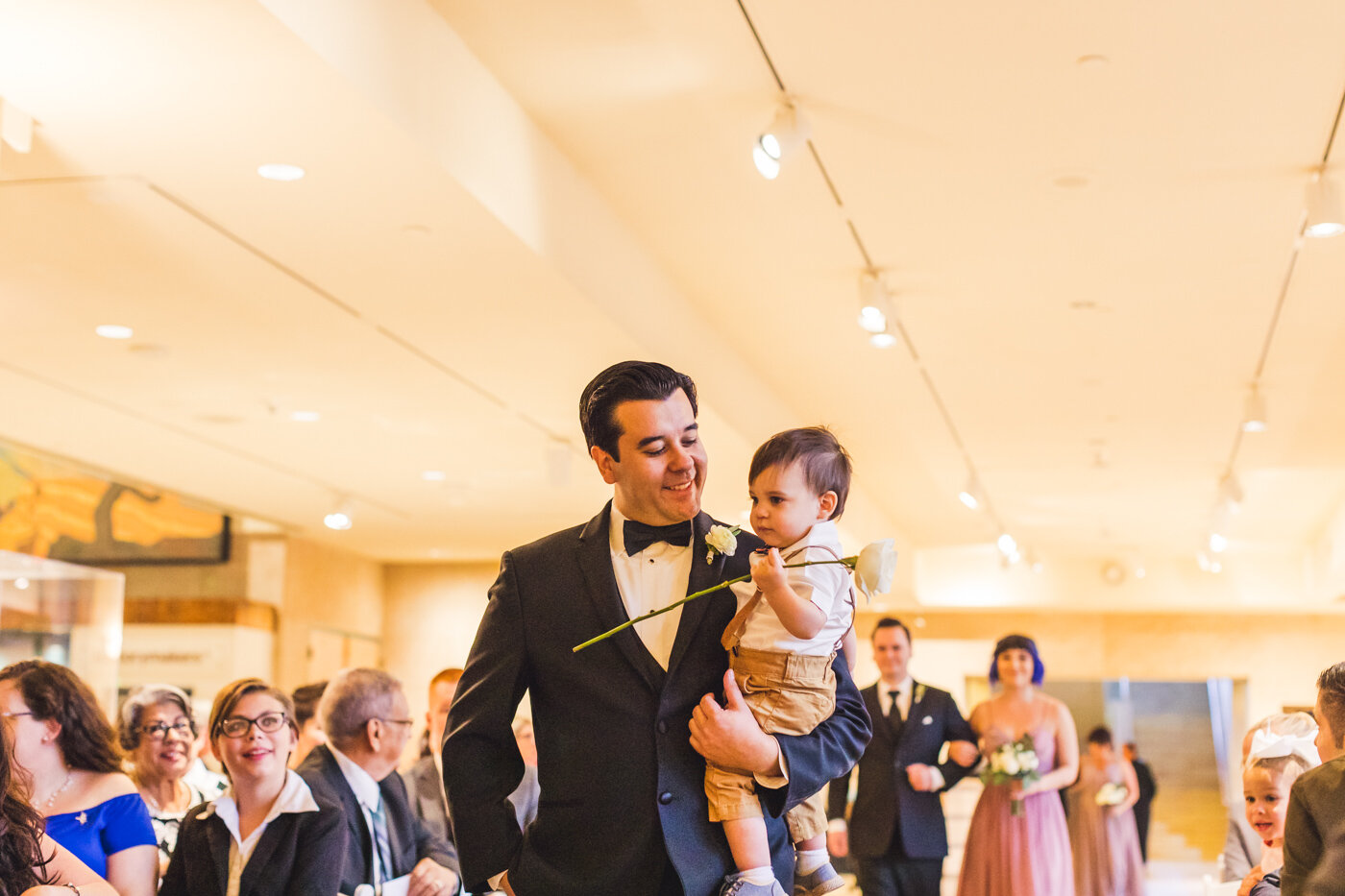 groom-walking-down-aisle-with-son