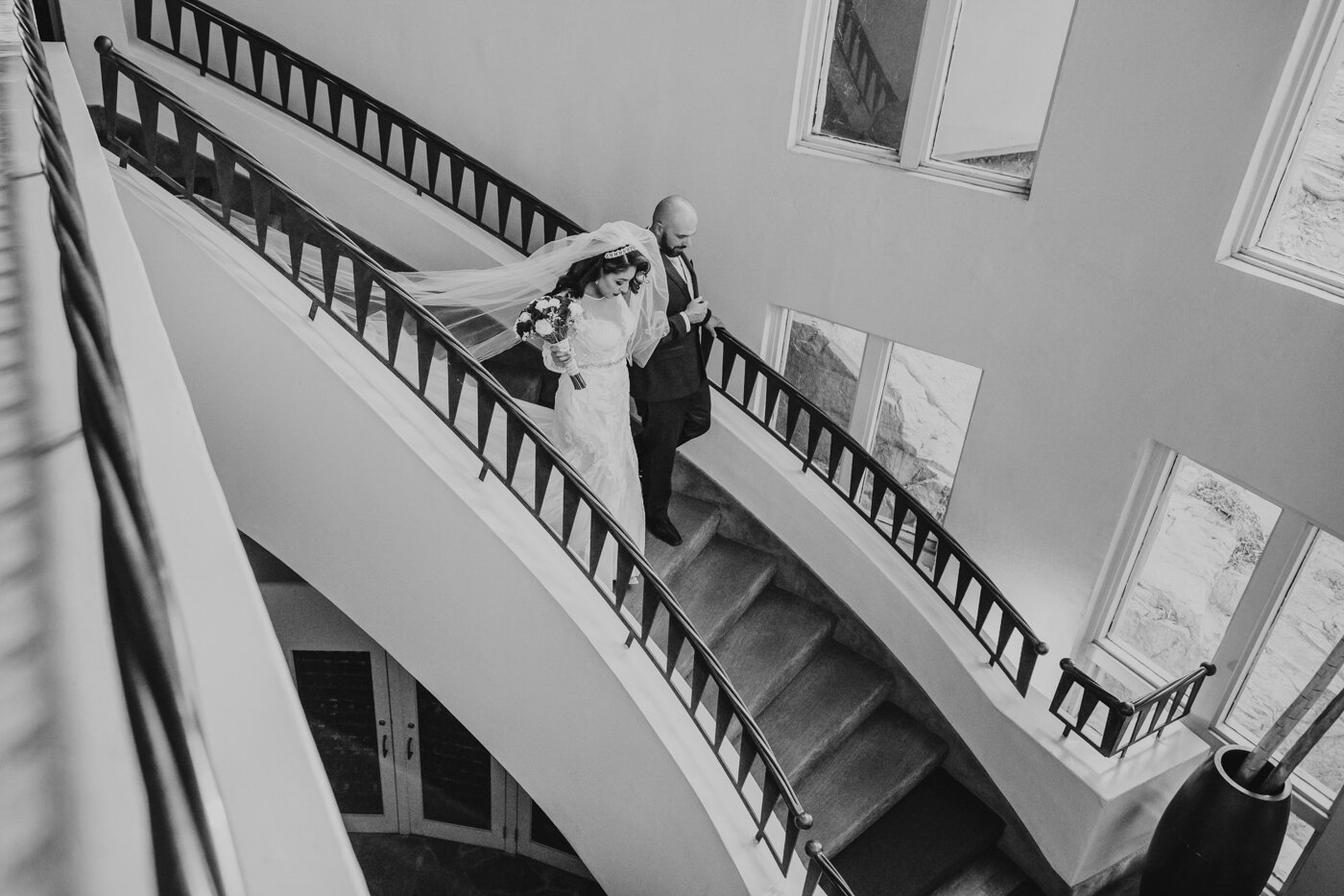 bride-and-groom-coming-down-stairs