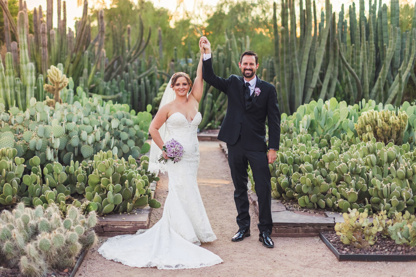 bride-and-groom-celebrating-at-desert-botanical-garden