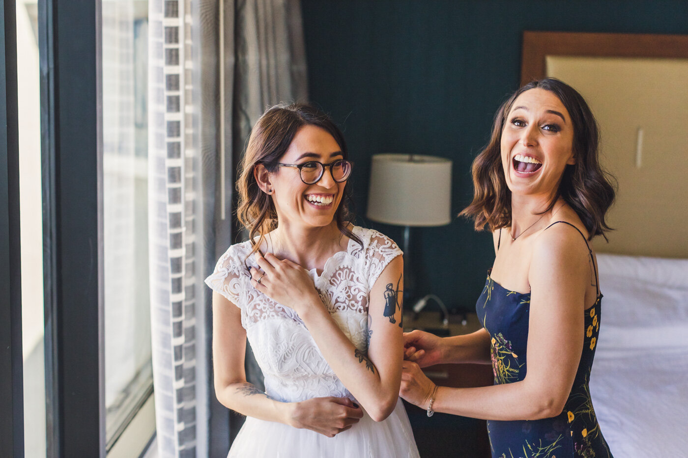 bride-and-bridesmaid-laughing