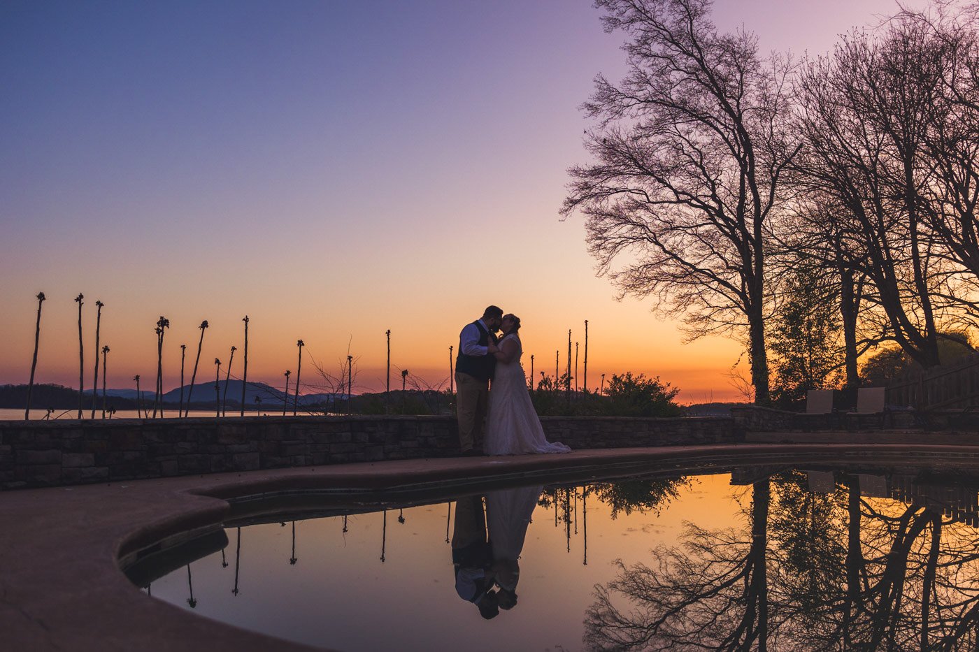 bride and groom kissing at sunset tennessee wedding