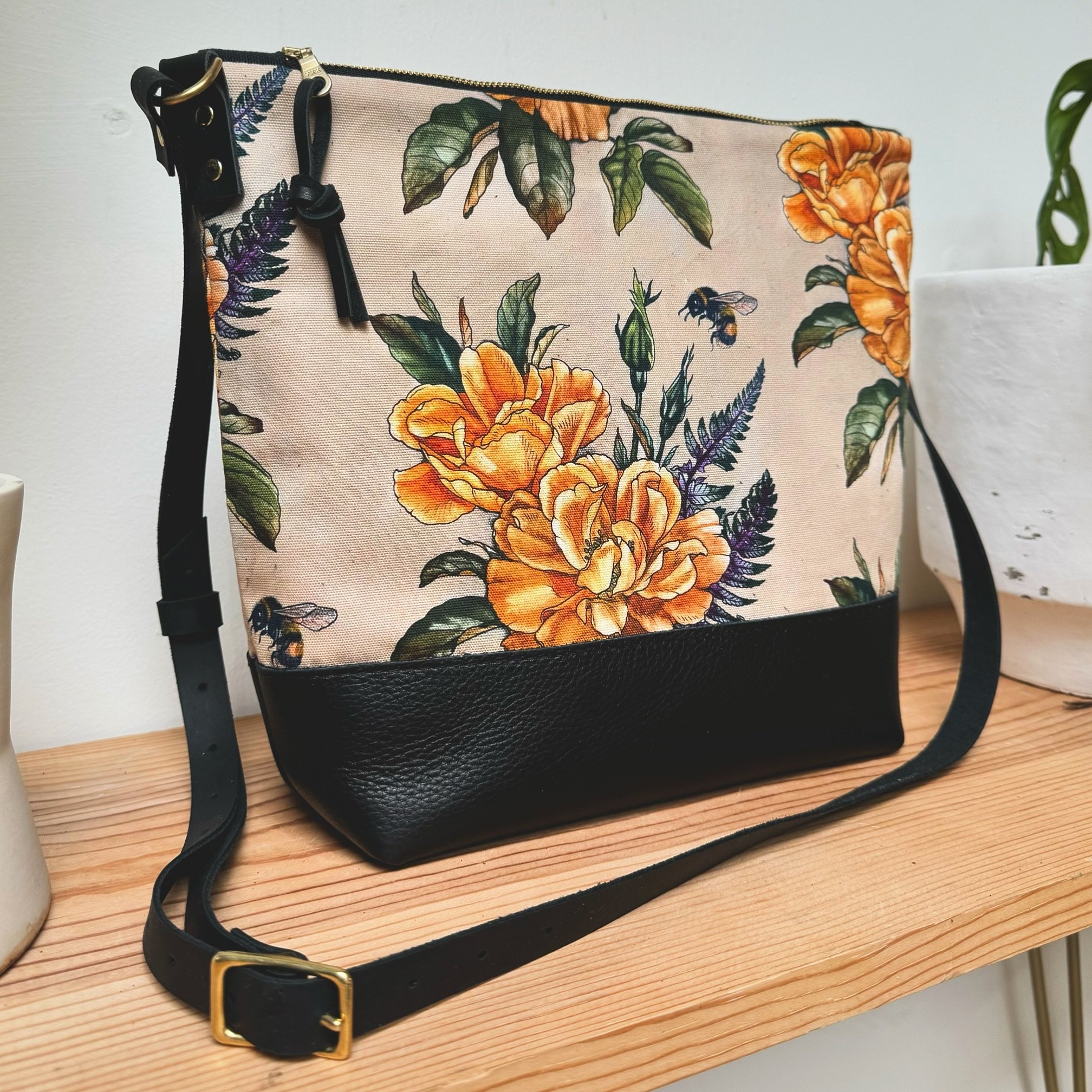 I LOVE this new bag! Our new Coco Crossbody, shown here in gorgeous fabrics designed by @alicestattoos of @wonderlandpdx 💛 in Yellow Rose with Fern &amp; Bee. 🐝 The perfect size and 4 interior pockets to organize all the essentials. Your choice of 