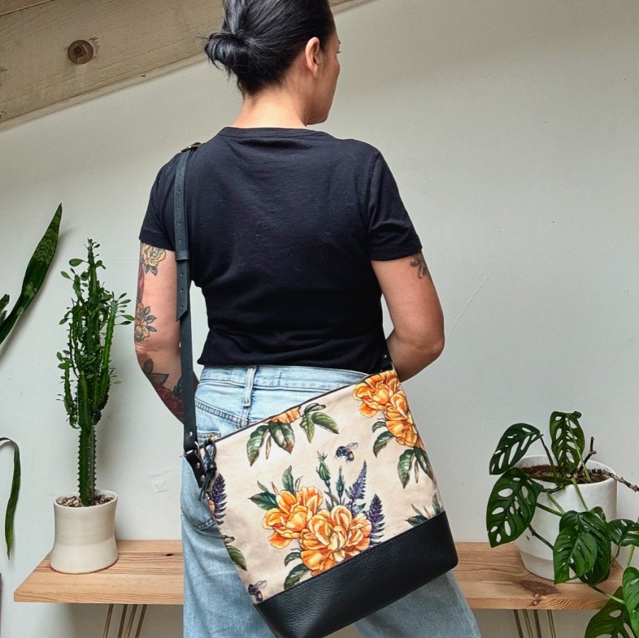Can&rsquo;t wait to use our newly designed Coco Crossbody on my upcoming trip to Japan! The perfect size for walking around and seeing the sights. Looking gorgeous in our latest collab prints designed by @alicestattoos 💛 Shown here in Yellow Roses w