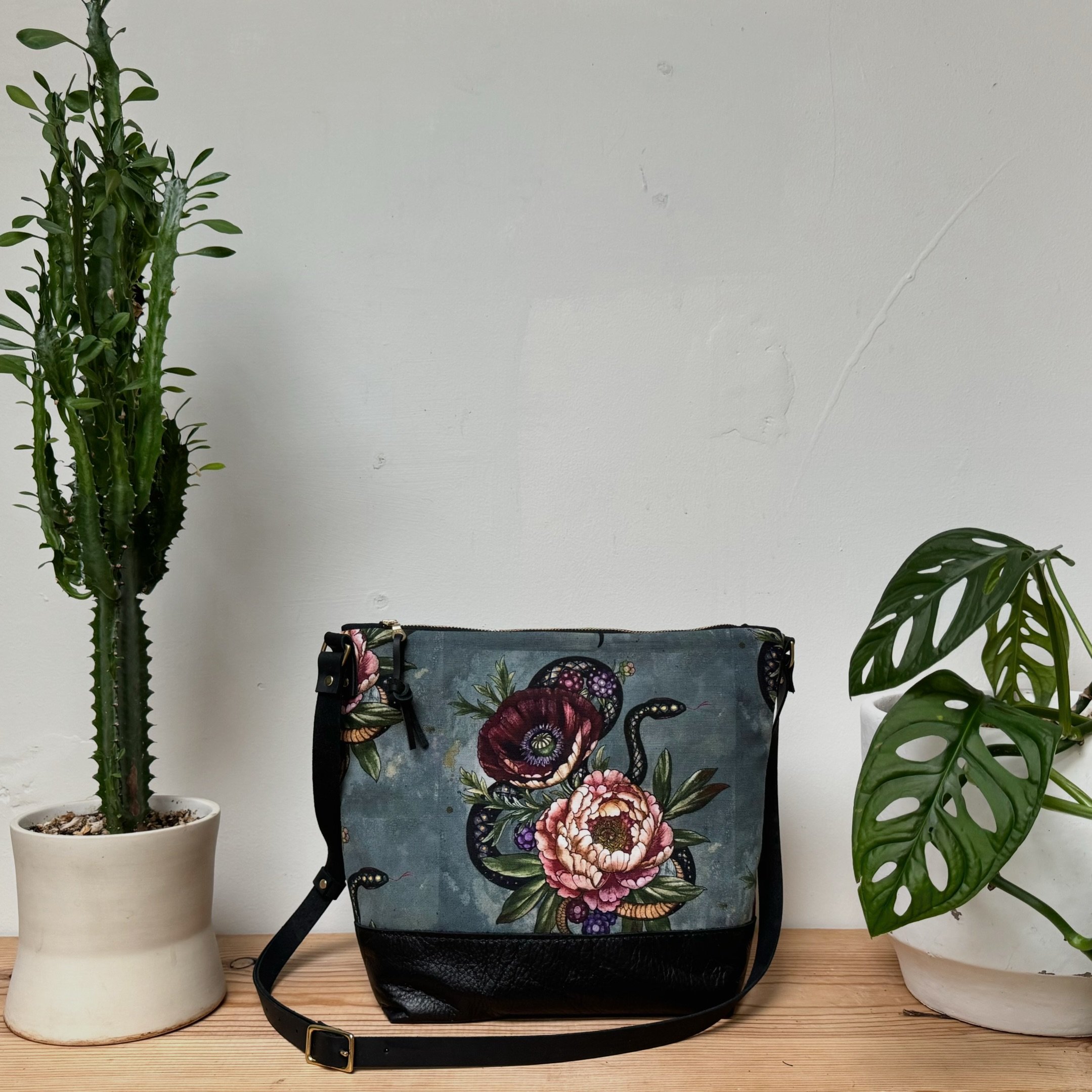 Finally! Our new bag style, the Coco Crossbody. Looking fabulous in the latest, gorgeous prints designed by @alicestattoos 💛 Shown here in Snake, Peony, Poppy and Honey Bee with black leather bottom. Has 4 interior pockets for organizing all the ess