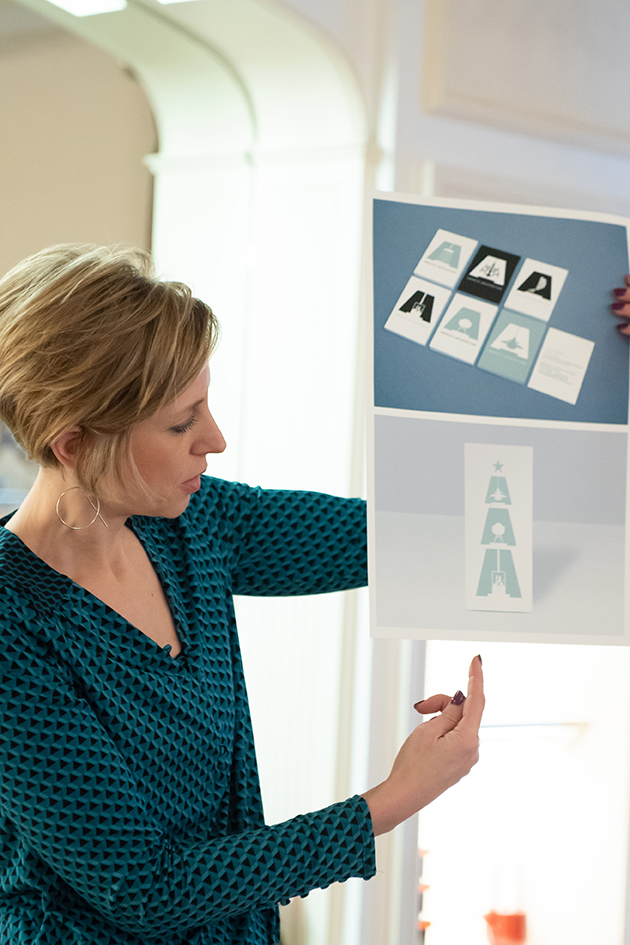 Using a Christmas reference - word, shape or playful reworking of something familiar could be the best choice.