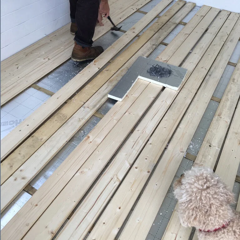 floor-being-laid-cabin.jpg