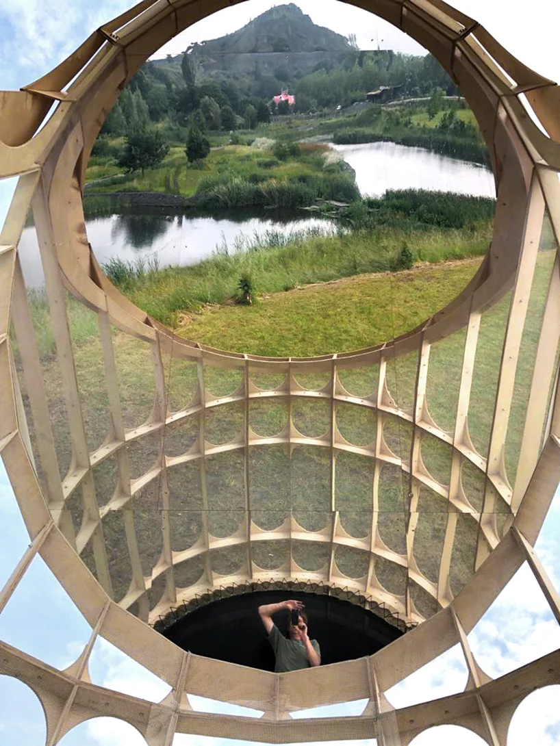 Lying on the trampoline people can experience the landscape from a bird eye perspective