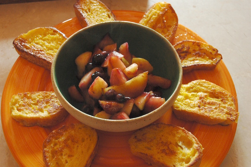 French toast served with mulled peaches and blueberries 