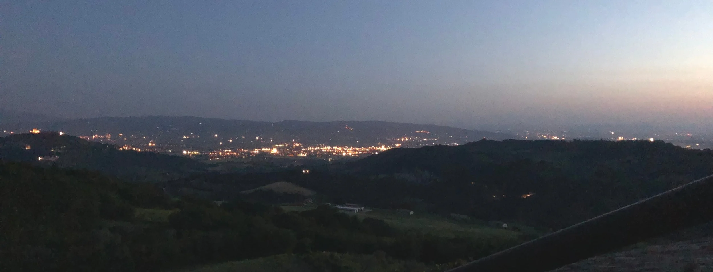 Sunset view of Assisi from my B&B room at Alla Madonna del Piatto Agriturismo