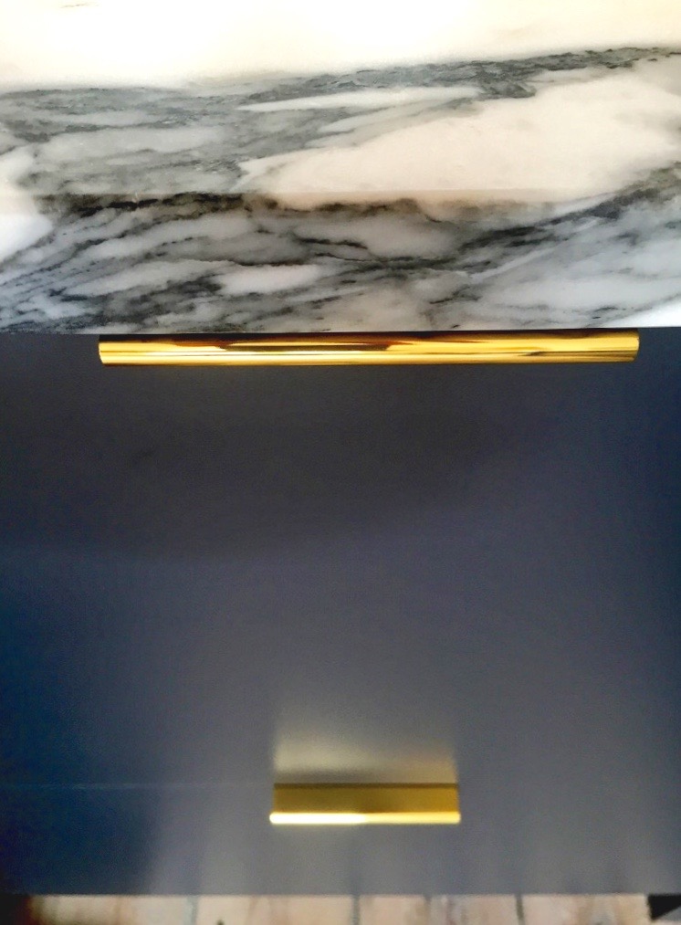 Detailing brass cabinet handle for kitchen draw