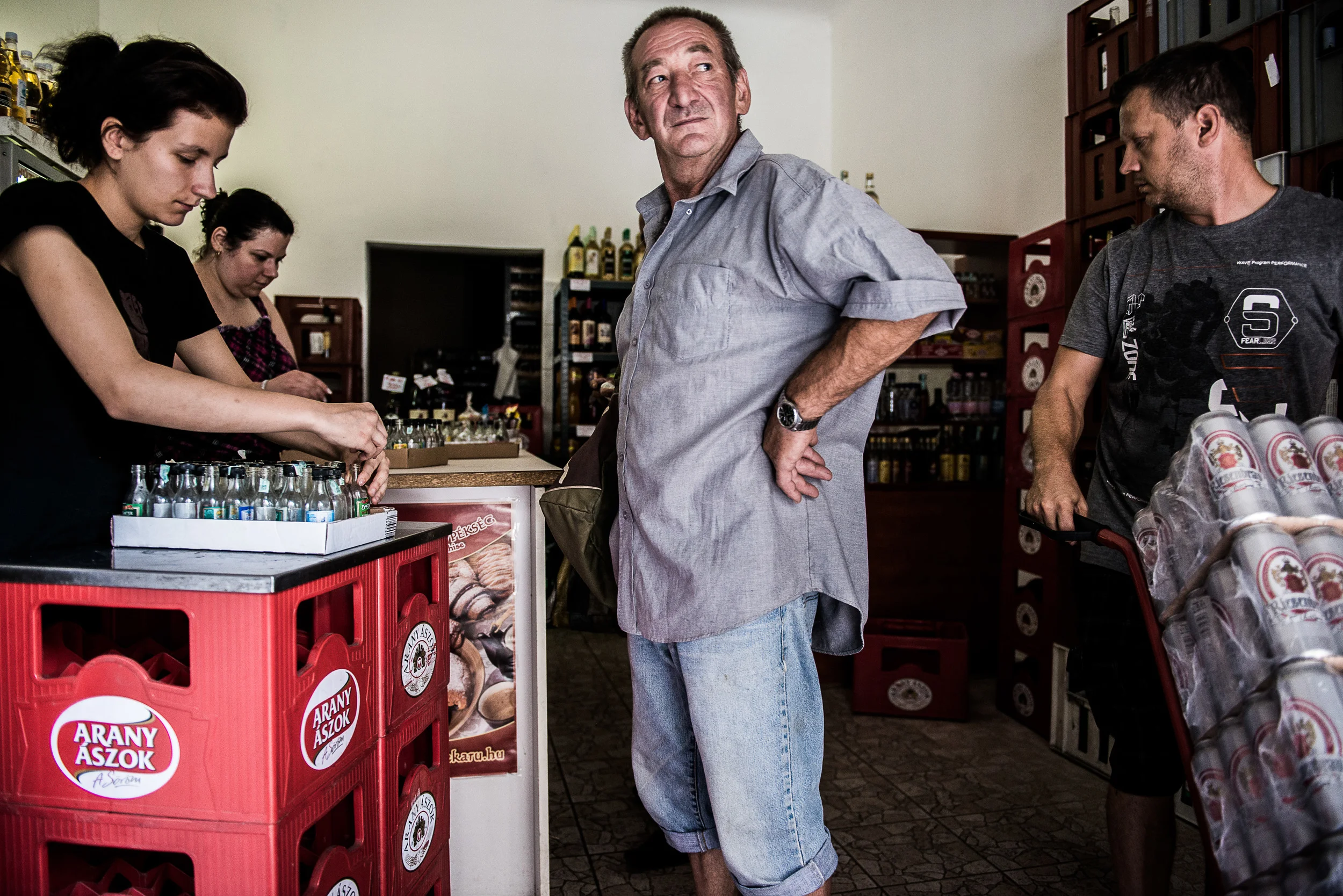 Returned used bottles are taken away from a grocery store in the eight district of Budapest..