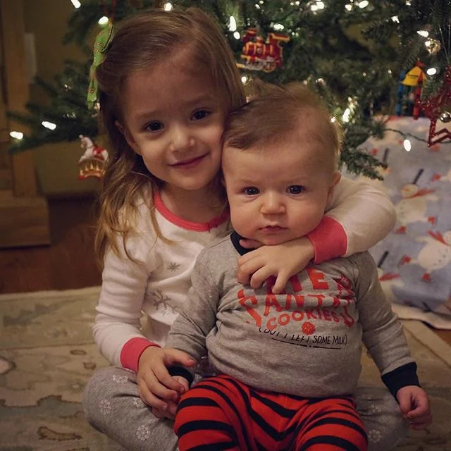 Merry Christmas Eve eve. After bath time, the kids were surprised with new Christmas pajamas. Hattie said &quot;Look at my beautiful new pajamas. They have beautiful, sparkly snowflakes on them!&quot;