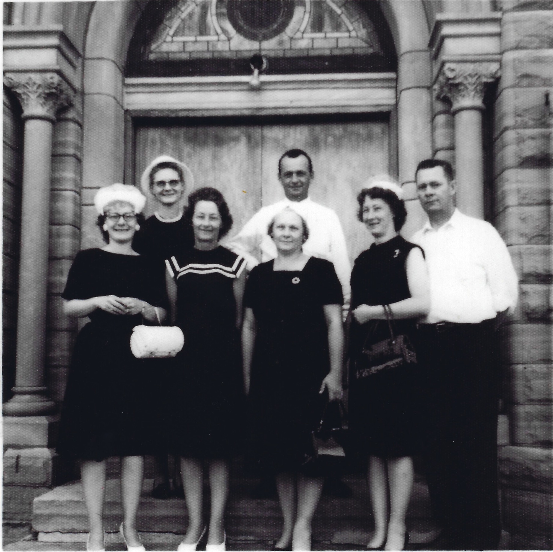 Grandma Joyce (bottom left) and six out of her eight siblings.