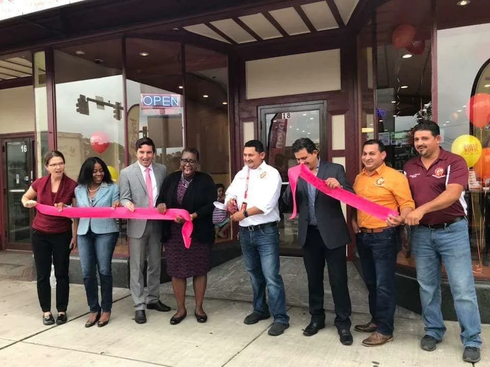 Mayor Spicer leads a ribbon cutting at Pollo Royal (18 Irving Street) in September 2018