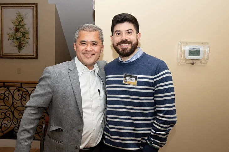 Robert helped property owner Brian Li, left, use the City’s Sign and Facade Subsidy program to install 8 new awnings this Spring