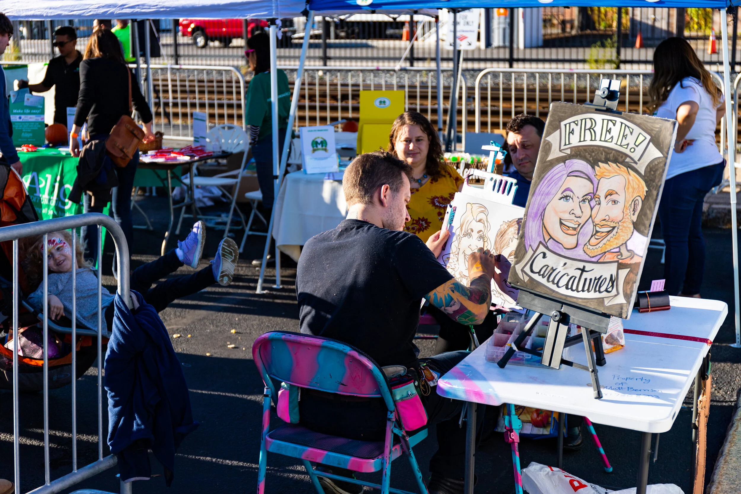 Caricature Time with Matt Berson at intersection of routes 126 and 135. Photo credit Itala Keller.