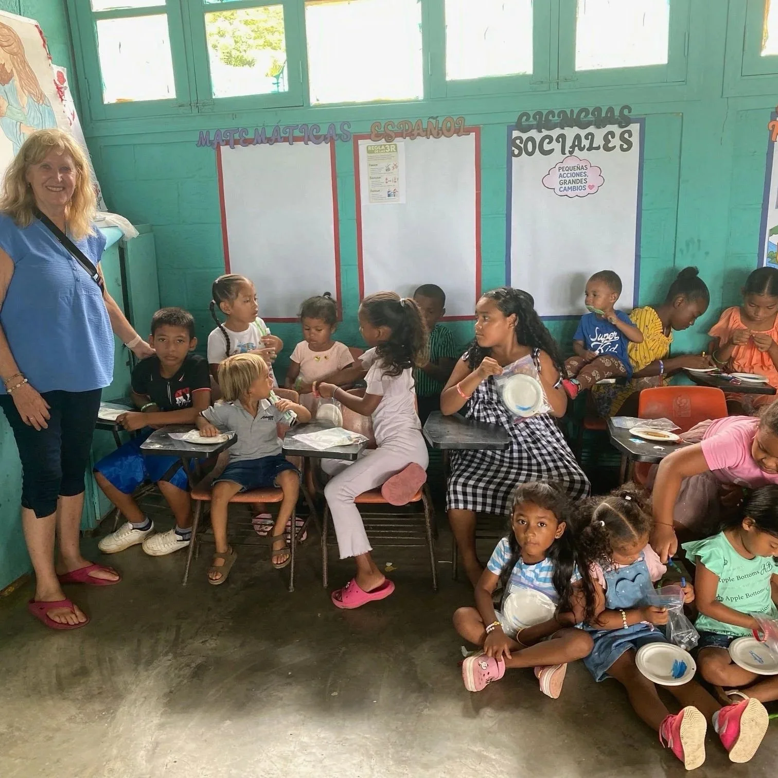 Linda working with the children of Plan Grande.
