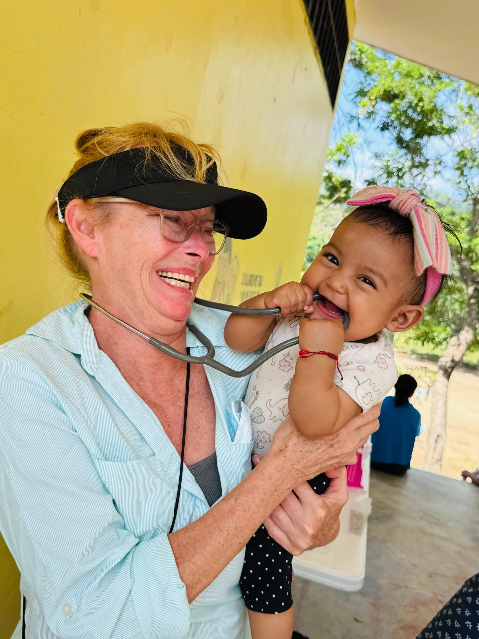 Nurse Tami and child.