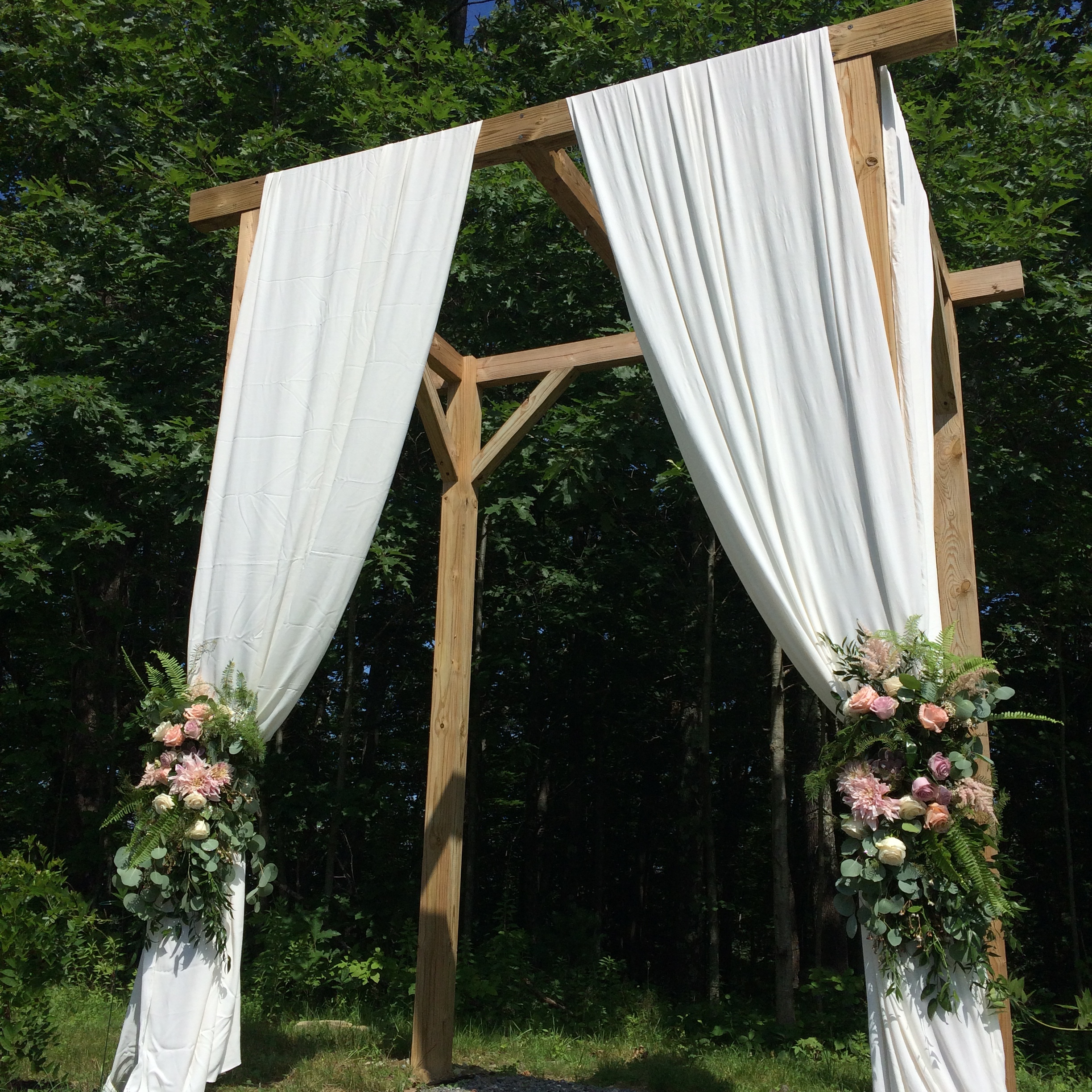  Floral decor on  The Barn at Silver Oaks Estate 's arbor. 