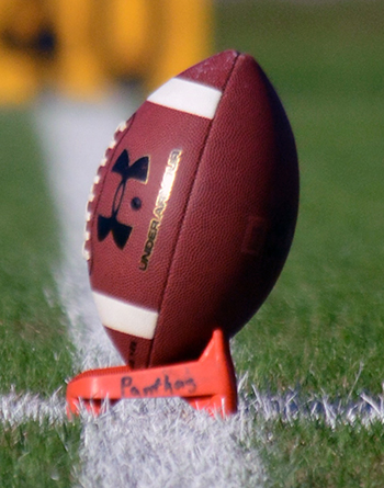 The ban, which will take affect in the three youngest divisions when the season begins this fall,