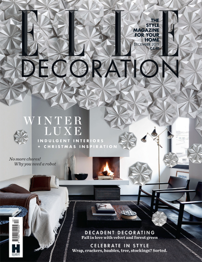 A cascading avalanche of hand-folded flowers for Elle Decoration's December 2015 issue.