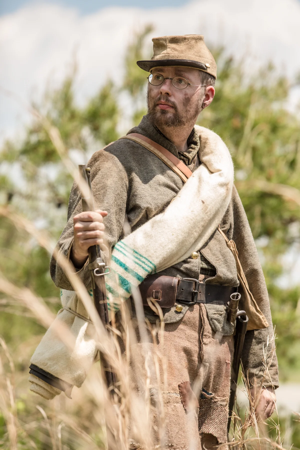 One of the re-enactors hired for scenes. See that grass? You know what lives in that grass? Ticks. My tally was 9 pulled off of me, including 3 lone star ticks. But . . . I got the shot. 