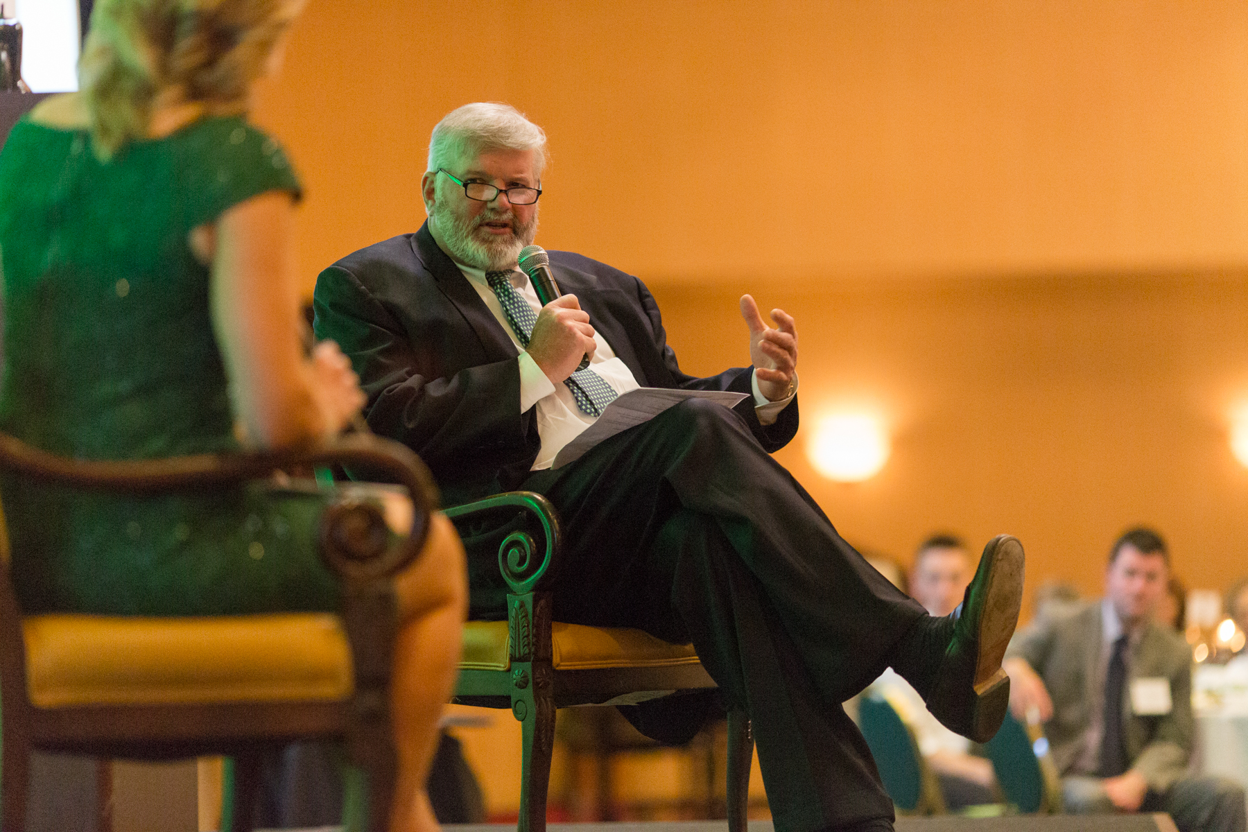 Kris Farley interviews Judge Tim Irwin on his program within the Children's Emergency Shelter during the event.