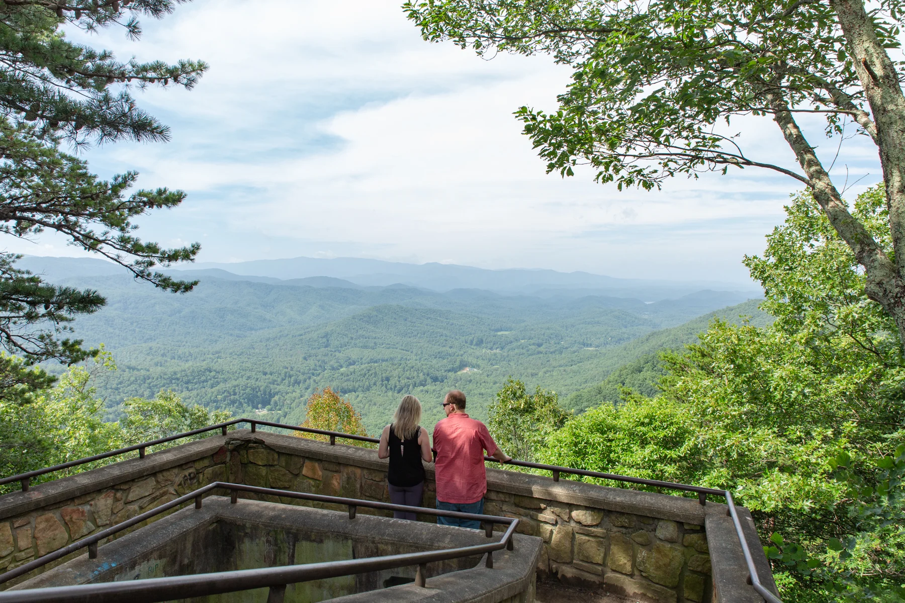 The unsuspecting bride enjoys the view of the Smokies from Look Rock on the Foothills Parkway