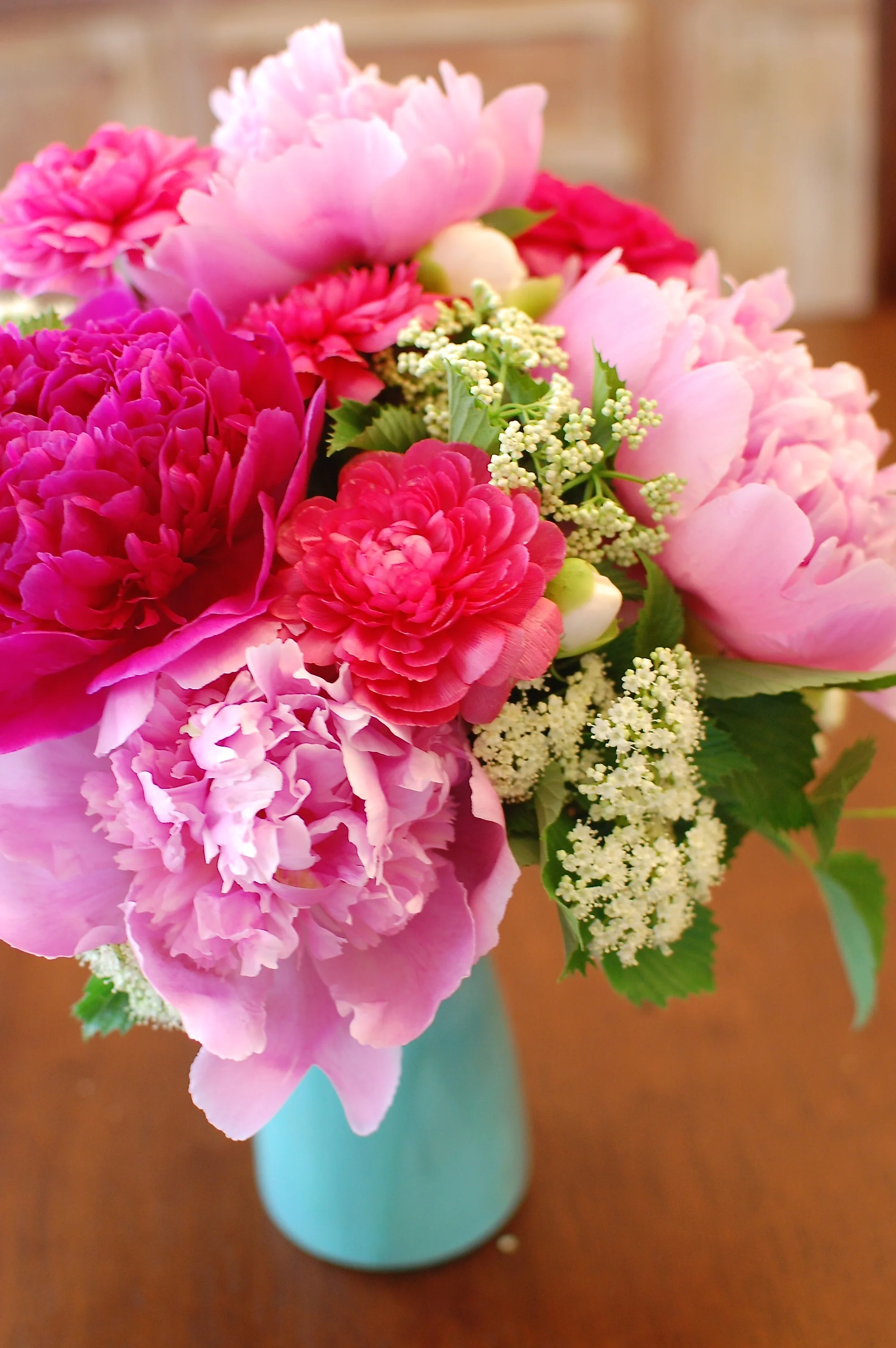 Peonies, ranunculus, and some greenery