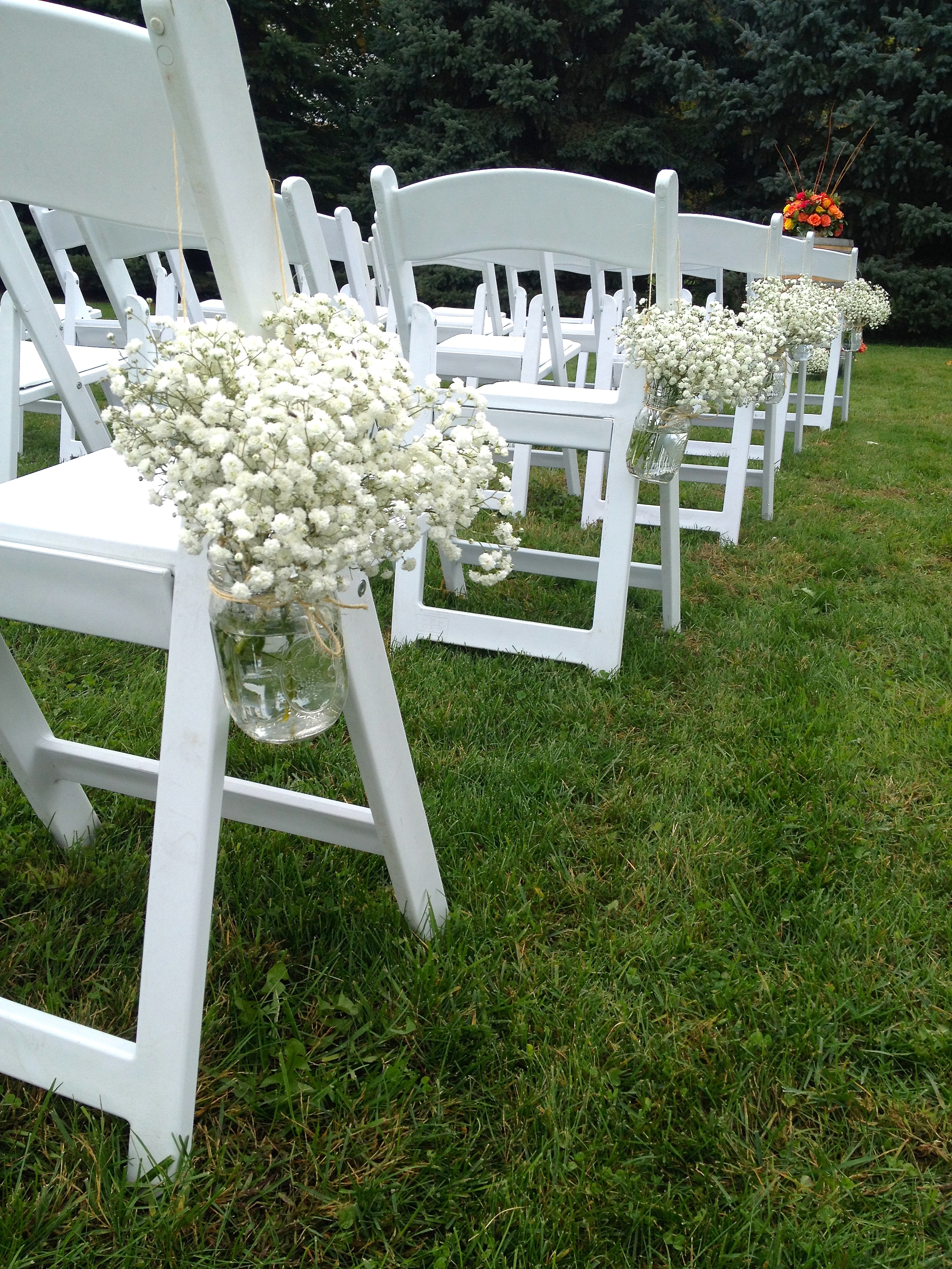 Babys breath in mason jars tied with twine