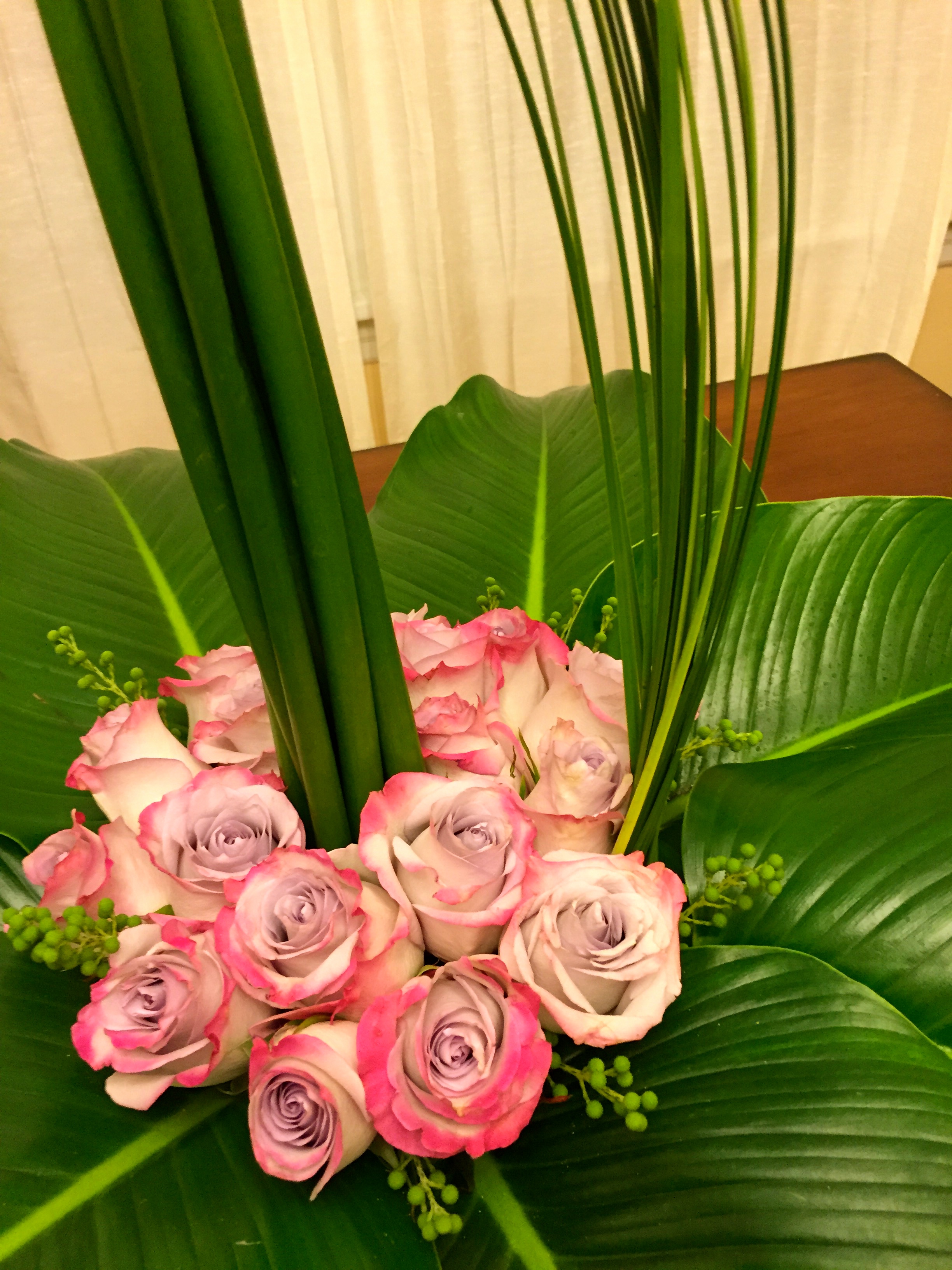 These roses are gorgeous! I love the lavender center and pink tips.
