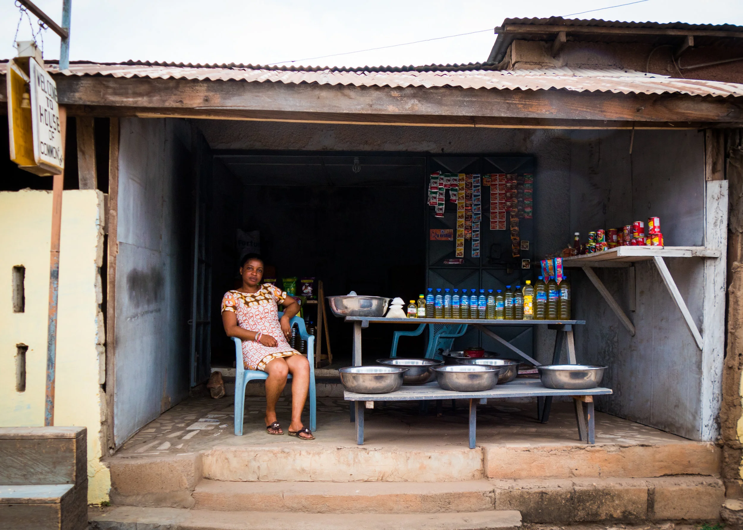 Kekeli Aryeetey, a shop owner in Accra, Ghana, says the country’s GDP growth doesn’t mean much for most people. “We’re still struggling for jobs,” she says. “You’re on your own to put money in your pocket.” (Tim McDonnell)