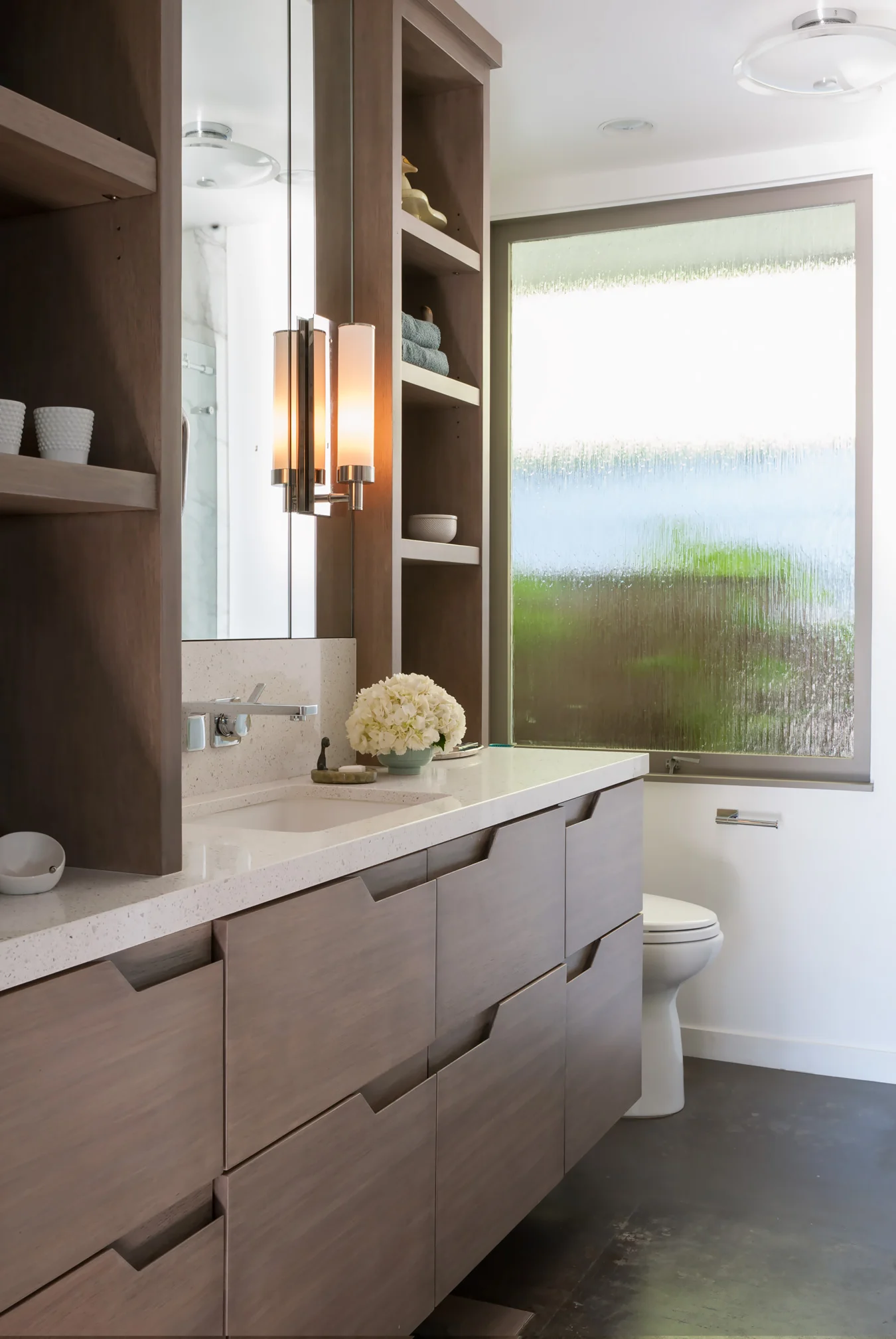 Main floor bath vanity with custom built medicine cabinet. Obscured glass for new window by Stained Glass Garden. General Contractor: Alderson Construction. Photography by Robert Whitworth