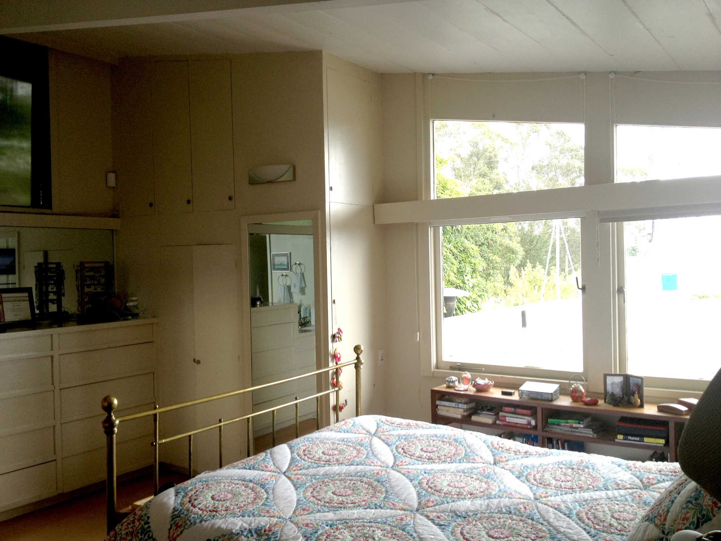 Before the remodel the bathroom was fully integrated with the bedroom with the exception of the WC.We turned the room around to face the view, added another window. The bathroom became fully enclosed. All within the original footprint.
