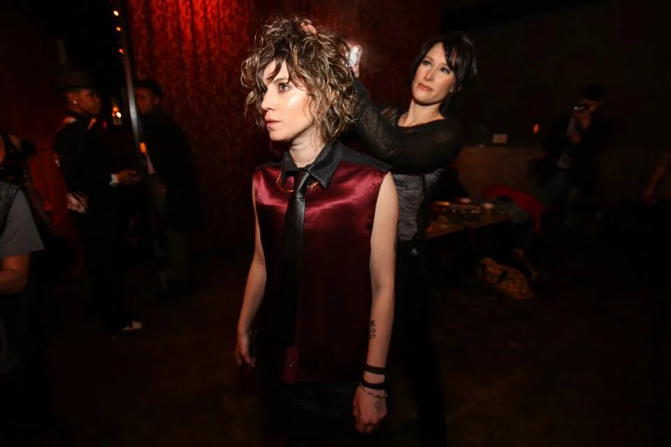 Model Lani Buess getting final hair touches backstage with Collette Lee | Photography by Grace Chu