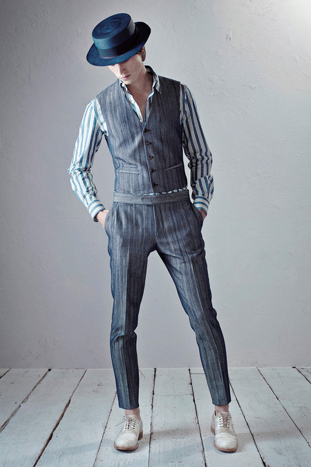 I love the entirety of this collection, which seems to me to combine an Italian cut with a more old-English aesthetic. In this particular look I love the understated pattern of the suit with the flashier shirt. | From: style.com
