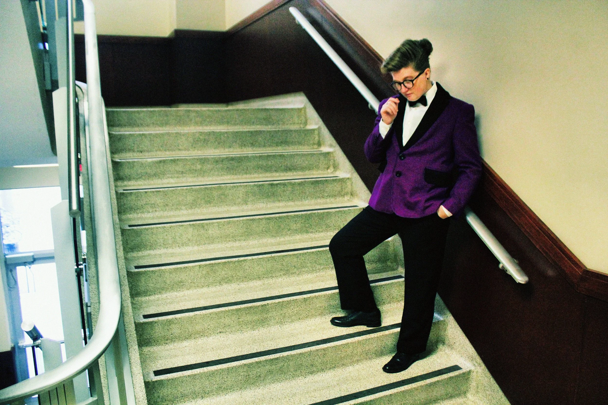 Never have I felt more like having a martini shaken and but not stirred. This suave purple tuxedo jacket with black contrast lapel was a perfect end to the collection.