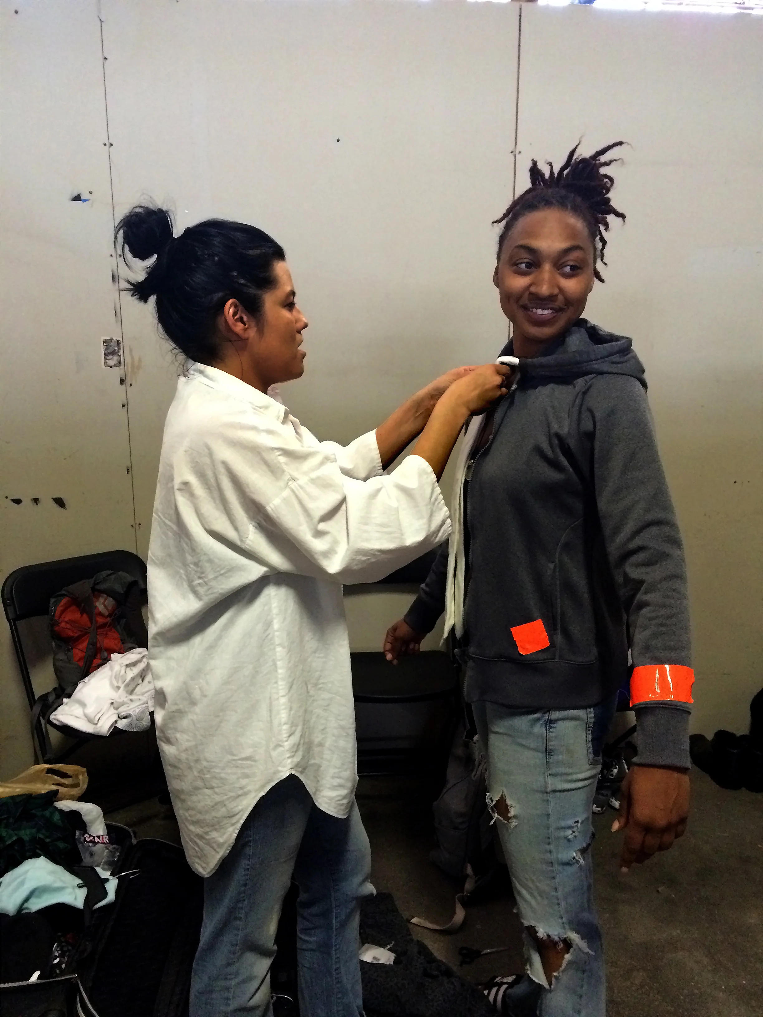 Rupi fitting model Alli in the hoodie-tie