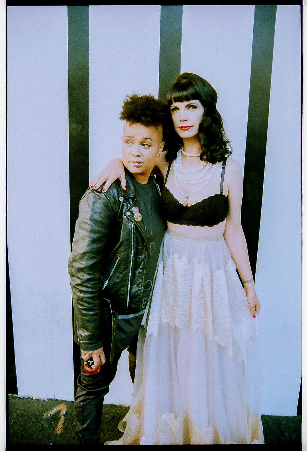 Chad: Michael Stars Shirt / Blissker Pants / Leather jacket & shoes stylist’s own Barbie: Single Sheer full length skirt / Bra, pearls & shoes stylist’s own