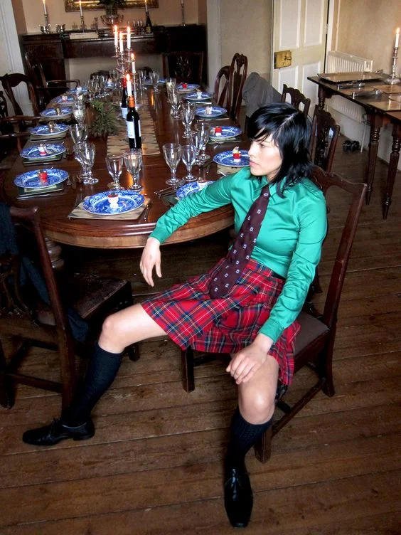 Qwear's fashion director Rupi celebrating masculinity with a kilt, as featured on dapperQ's instagram. Photo by Kent Photography.