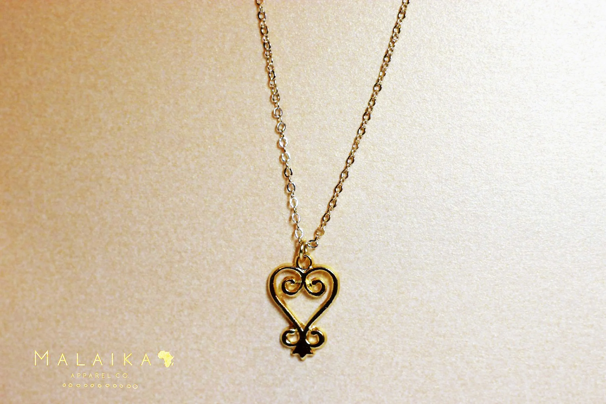 Sankofa necklace by Malaika Apparel