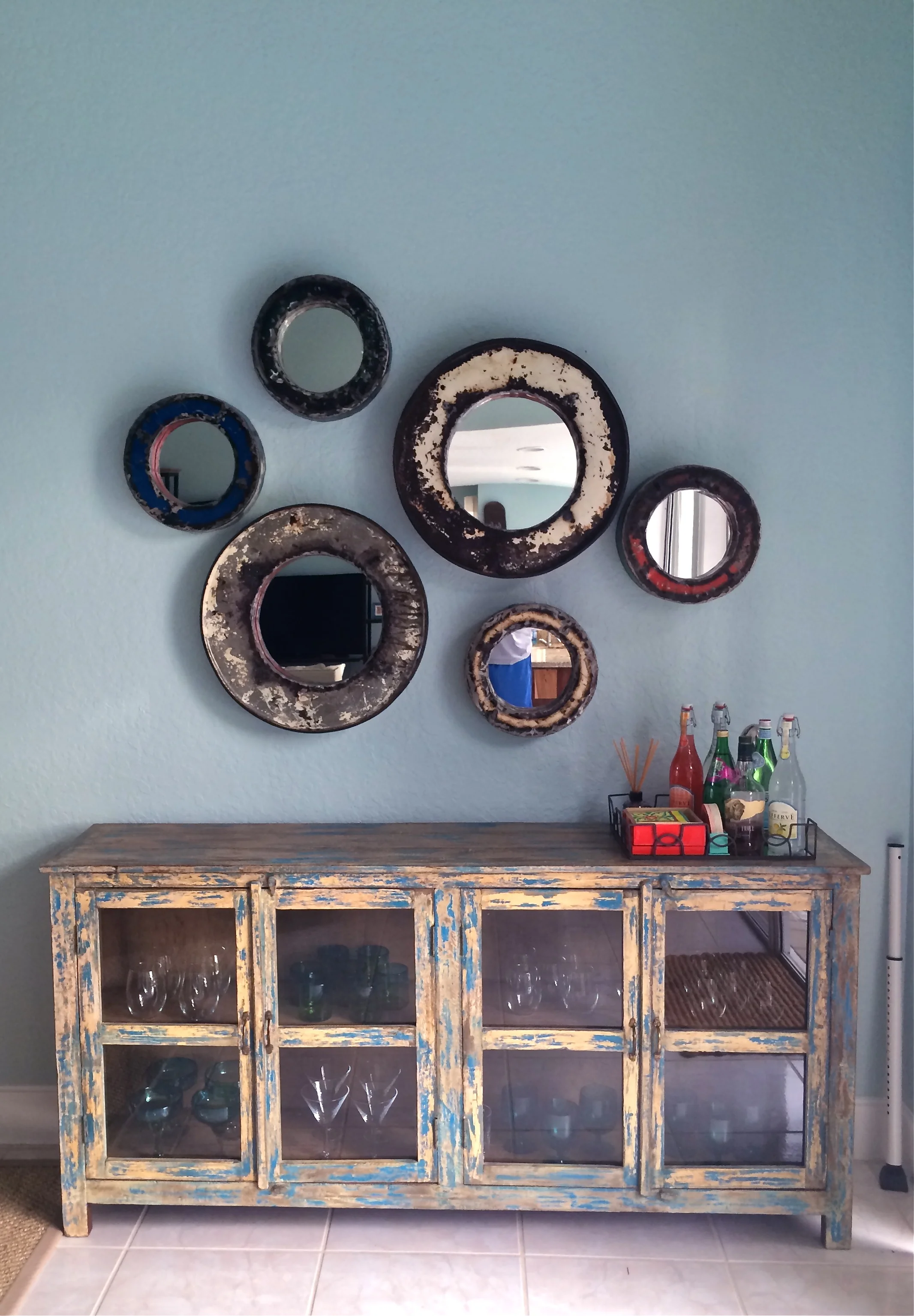 Vintage Indian buffet with Bali oil drum mirrors...