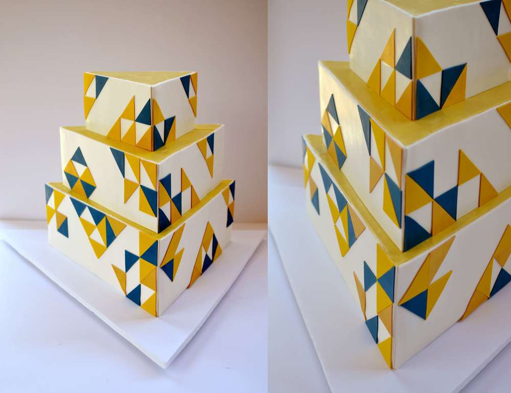 Triangular wedding cake with handcut geometric design. Images © Carla Schier