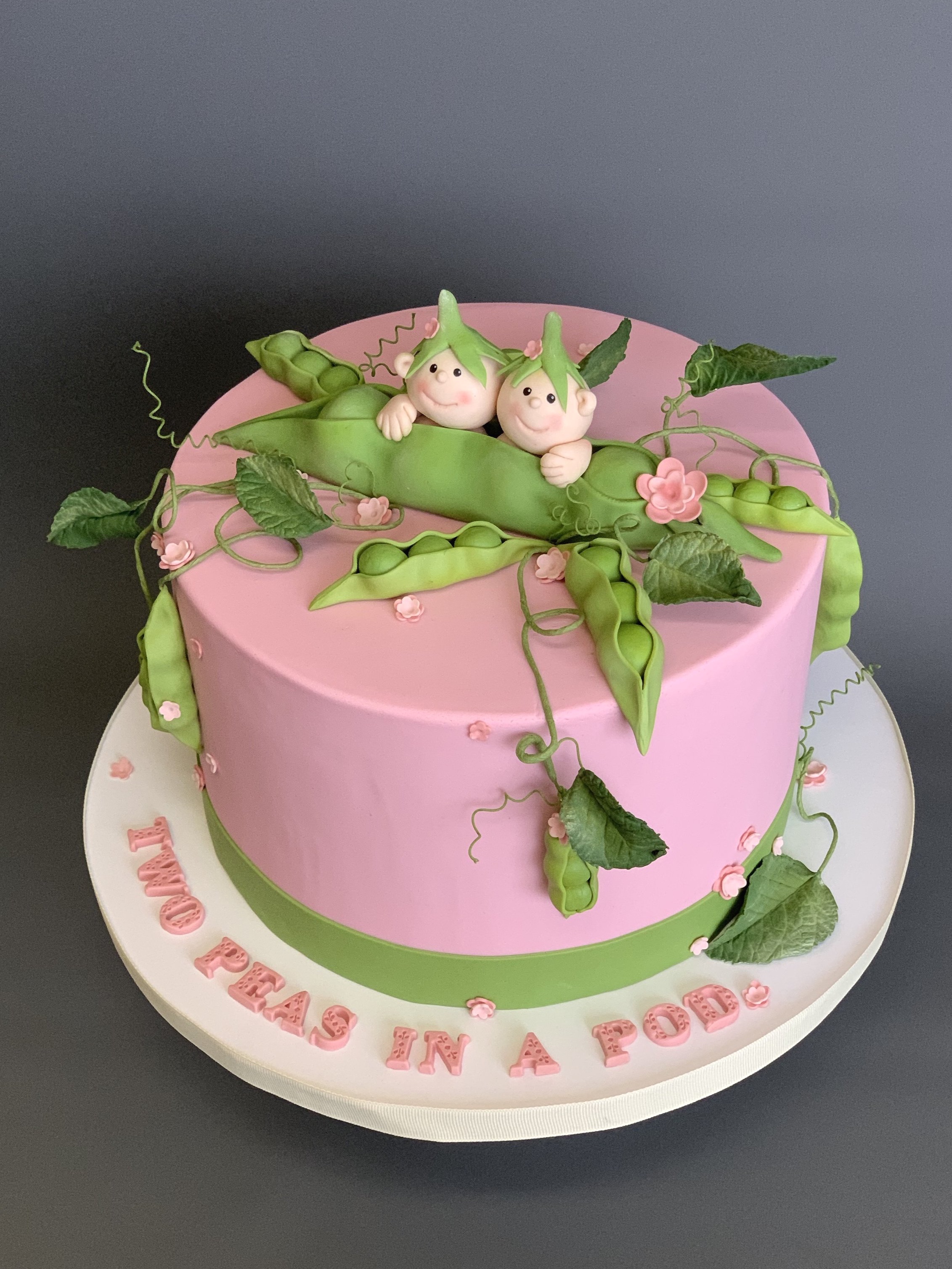 "Two peas in a pod" baby shower cake. Image copyright Carla Schier.