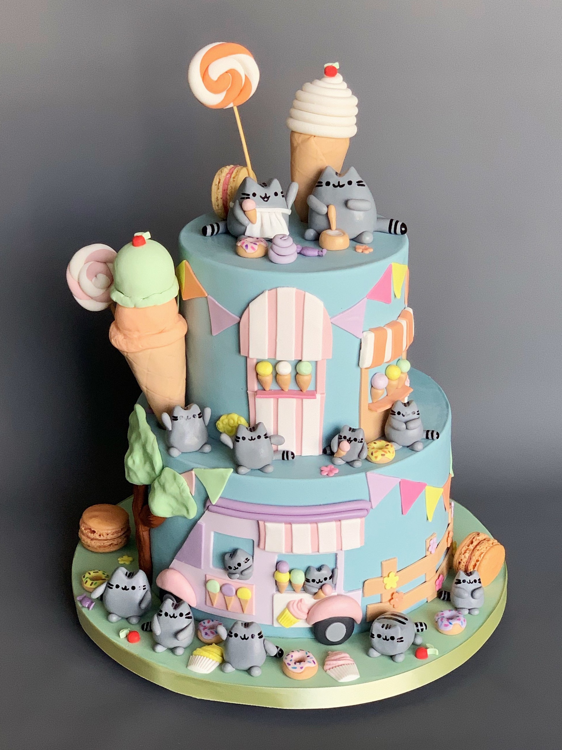 Pusheen cat cake with ice cream truck and entirely edible hand sculpted details. Image copyright Carla Schier.