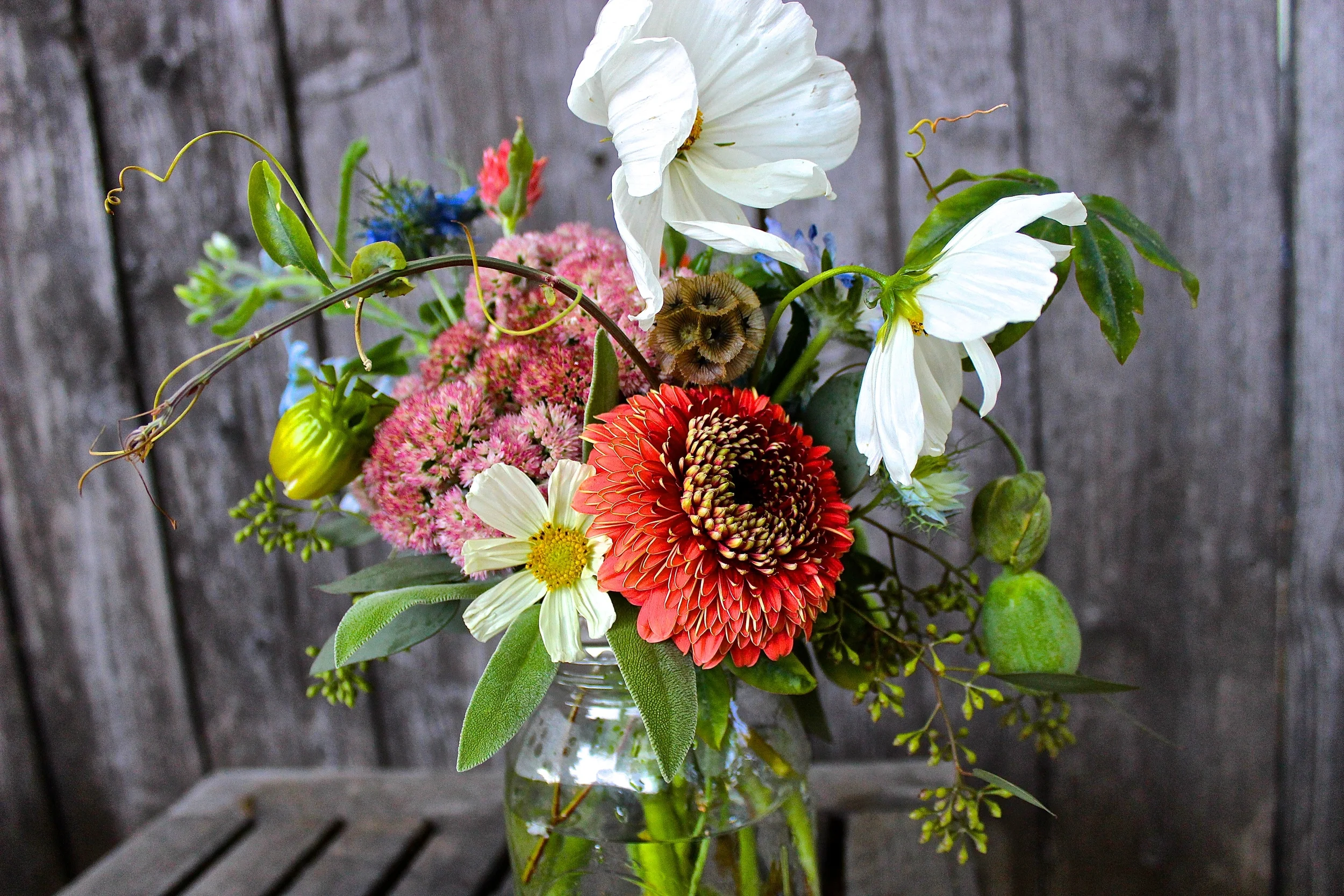 These centerpieces were created for the wonderful ladies at Backdoor Bistro to celebrate their monthly Winemaker's Dinner. We LOVE Backdoor Bistro and are so excited to watch their delicious restaurant grow into a hometown staple.