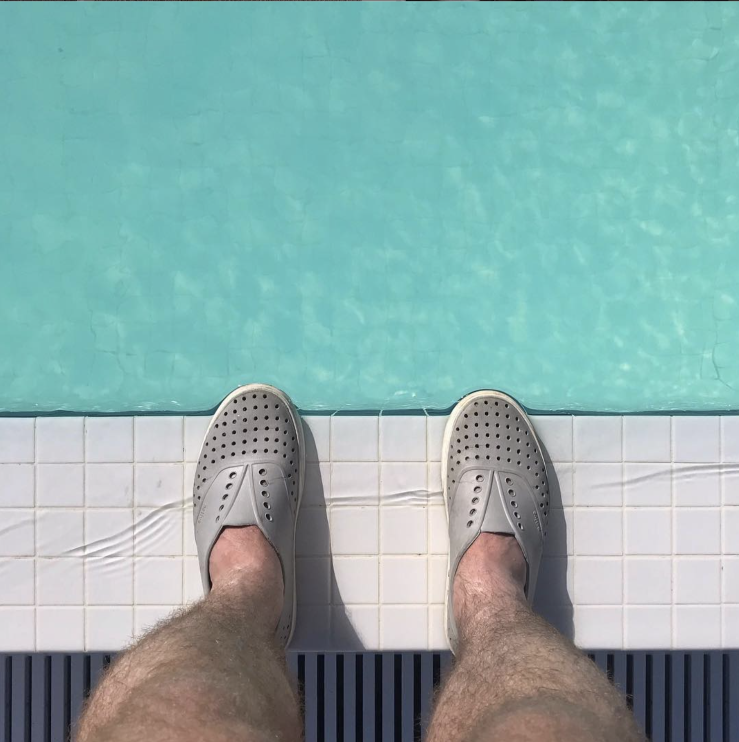 “I’m in Miami, Florida. They have a pool here. On the roof. Here’s a pic of my shoes to prove it.”