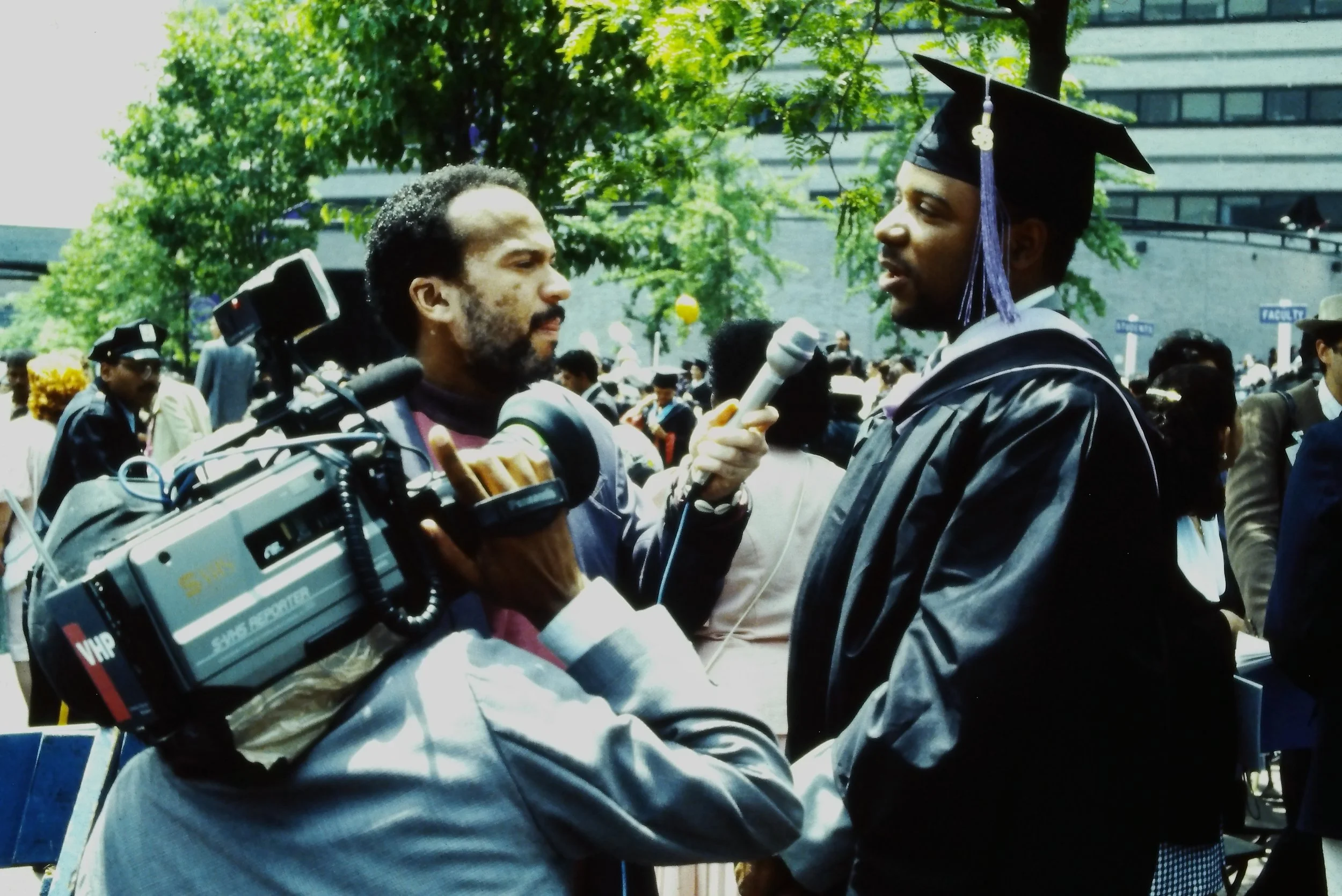  Photo of Patrick Williams at the CCNY Graduation in 1993 being interviewed by Orlando McAllister for CUNY TV 
