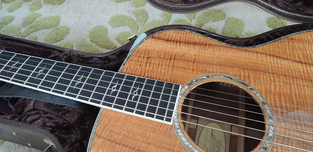 Oh my! My amazing Taylor. Hand picked to match my voice by Nikki Matheson. Road trip to MA Guitar Emporium 2 years ago.