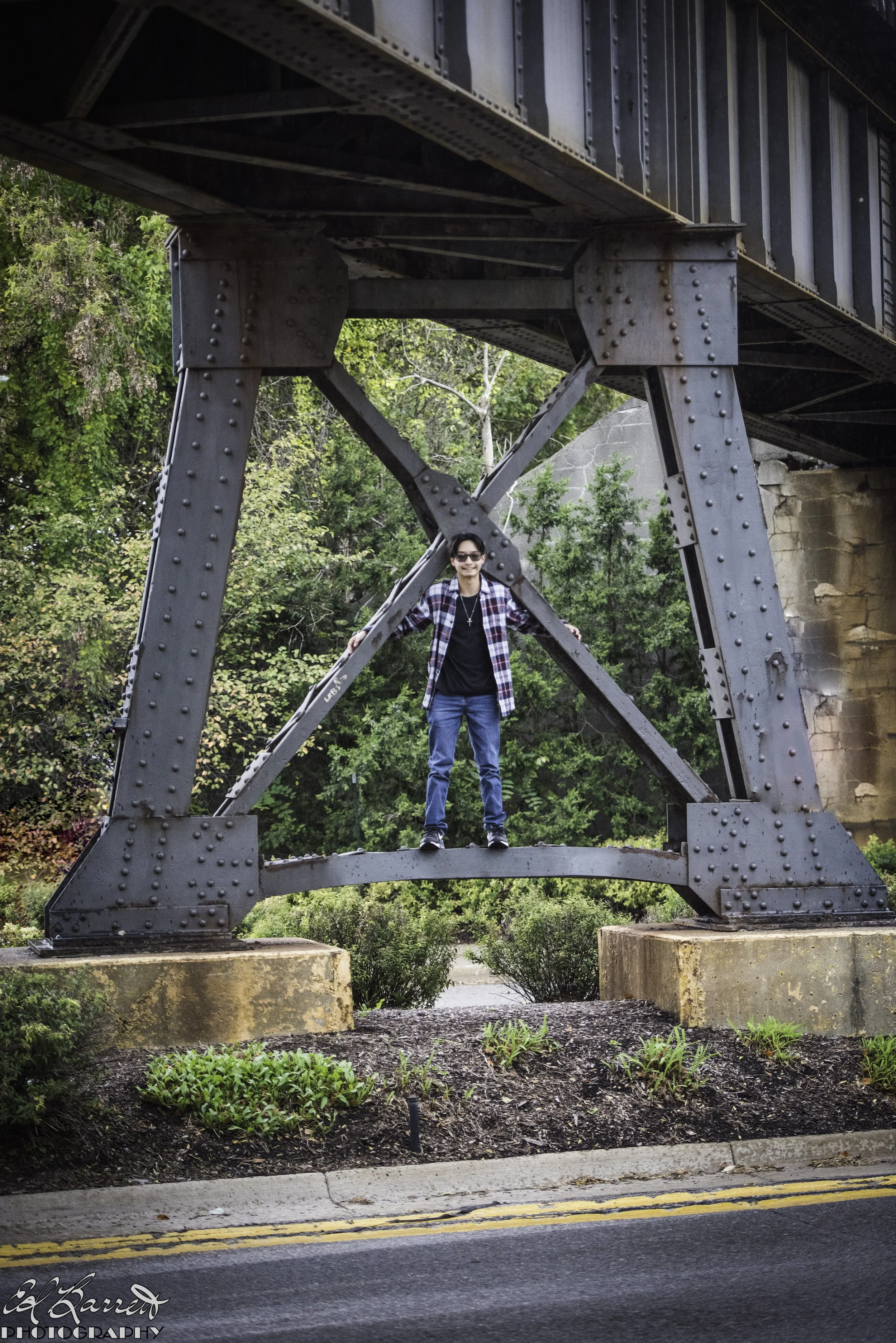 High_school_boy_downtown_under_viaduct+2__2023 (1 of 1).JPG